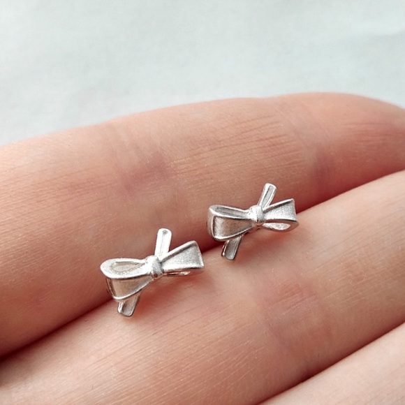 2/$20! 925 Silver Delicate Tied Bow Stud Earrings - Picture 3 of 8